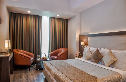 Noida Hotel | Relax at Hide Away Suites with Pool and Family Amenities