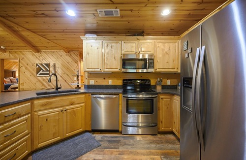 Broken Bow Cabin | Unwind by the River: Pool, Hot Tub & Game Room Await
