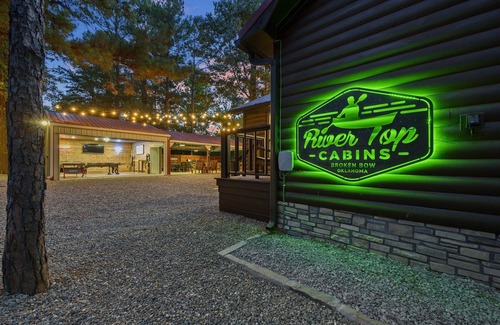 Broken Bow Cabin | Unwind by the River: Pool, Hot Tub & Game Room Await