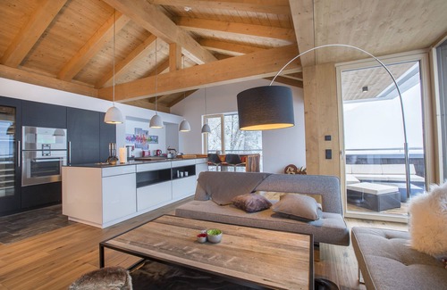 Schonbach House | Elegant Penthouse in Kitzbühel Alps with Sauna & Spa