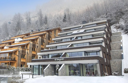 Schonbach House | Elegant Penthouse in Kitzbühel Alps with Sauna & Spa