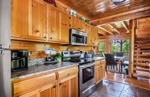 Gatlinburg - Pigeon Forge Cabin | Inviting Resort Cabin with Hot Tub, Games & Scenic Views