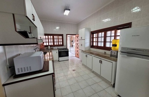 Peruibe House | Prime Location Suites with Pool and Ocean Views Await You