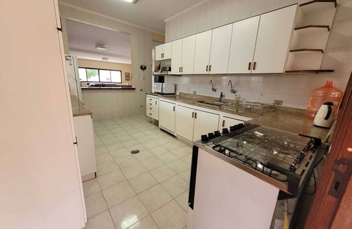Peruibe House | Prime Location Suites with Pool and Ocean Views Await You