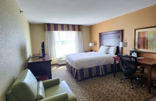 Minot Hotel | Relax at Highland Suites with Pool, Spa & Hot Tub Access