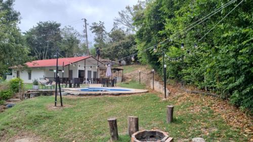 Apulo Other | Discover HIKIA Tocaima: Oceanfront Oasis with Hot Tub