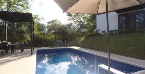 Apulo Other | Discover HIKIA Tocaima: Oceanfront Oasis with Hot Tub
