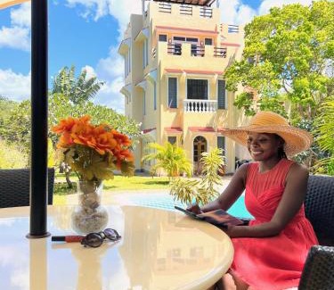 Diani Beach Bed & Breakfast | Experience Hilda's Homestay: Oceanfront Gem with Pool