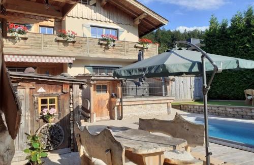 Kirchdorf in Tirol Apartment | Experience Oceanfront Bliss at Hilde 2 – A Poolside Escape