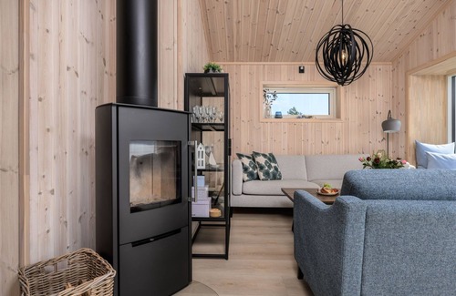 Hyllestad House | Hildebu by Interhome: Oceanfront Escape with Spa and Views