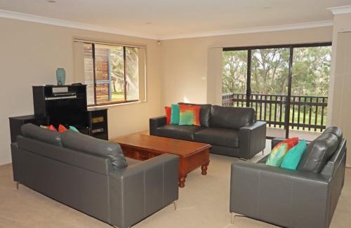 Sussex Inlet House | Breathtaking Hill Top Retreat with Water and Bush Views