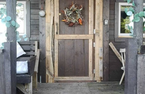 Penrhyn Bay Cabin | Experience The Crow's Nest: Hills and Sea Await You