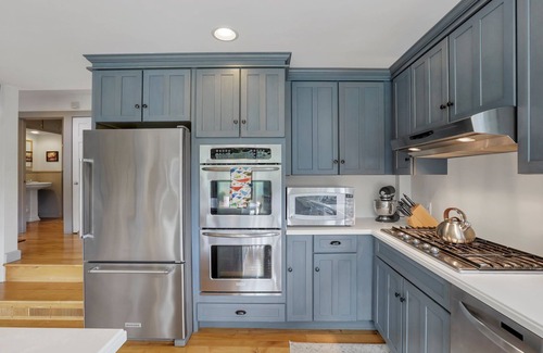 Logan House | Hillside Haven: Family-Friendly Retreat with Heated Pool