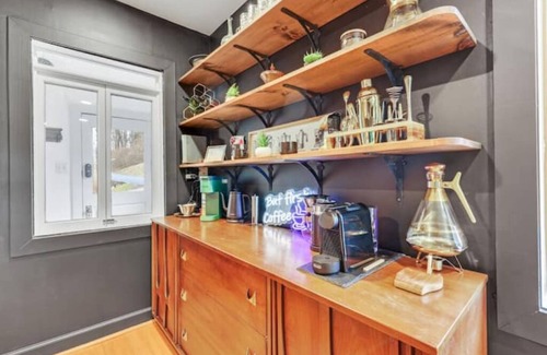 White Hall House | Hillside Haven: Outdoor Tubs & Vintage Library Escape
