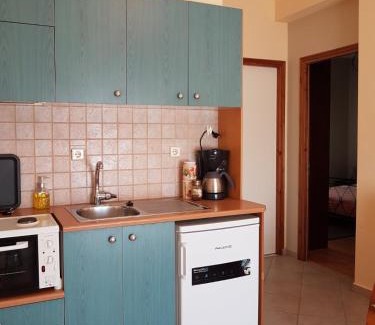 Loutraki Apartment | Top-Rated Hillside View Home with Family-Friendly Amenities