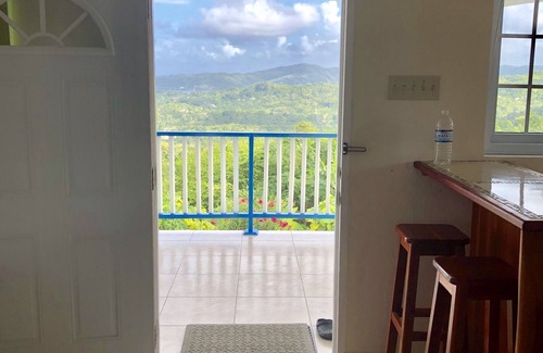 Lucea Apartment | Scenic Hilltop Studio with Ocean Views & Daily Breakfast