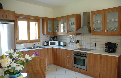 Petrothalassa Villa | Hilltop Villa with Oceanfront Pool and Guest House Retreat