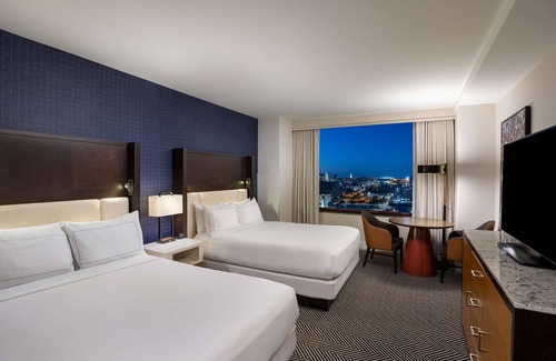 Waller Creek District Hotel | Relax at Hilton Austin: Family-Friendly Stay with Pool & Spa