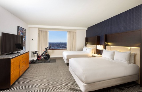 Waller Creek District Hotel | Relax at Hilton Austin: Family-Friendly Stay with Pool & Spa
