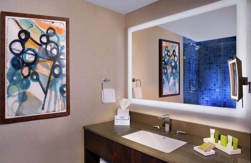 Waller Creek District Hotel | Relax at Hilton Austin: Family-Friendly Stay with Pool & Spa