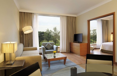 Embassy Golf Links Business Park Hotel | Elegant Escape at Hilton Bangalore Embassy GolfLinks