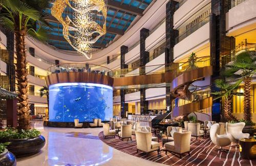 Chancheng Hotel | Elegant Hilton Foshan: Pool, Spa & Oceanfront Views