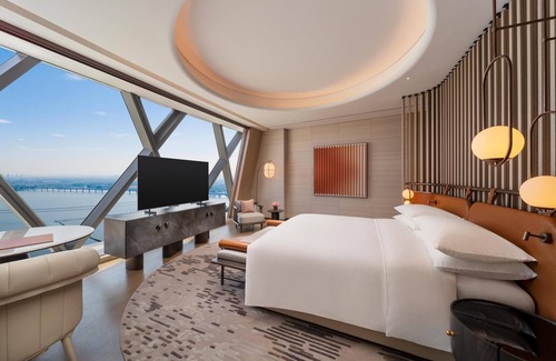 Nanxun Qu Hotel | Relax at Hilton Huzhou Nanxun: Pool, Spa & Dining Awaits