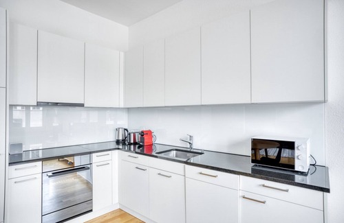 Langstrasse Apartment | Modern Langstrasse Room with Kitchen, Steps from Market