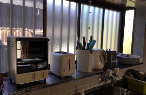 Yakushima House | Hirauchi Hot Spot: Family-Friendly Getaway with Kitchen