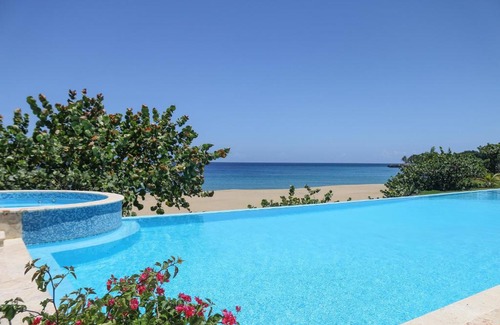 El Batey Apartment | Beachfront Bliss at Hispaniola Beach with Ocean Views