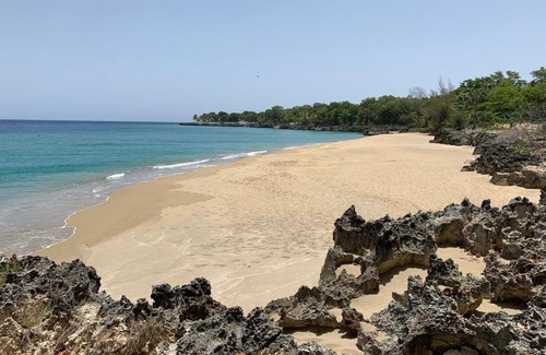 El Batey Apartment | Beachfront Bliss at Hispaniola Beach with Ocean Views