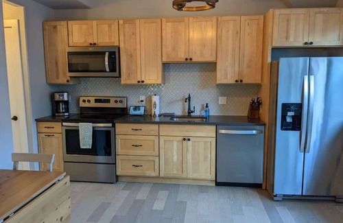 Traverse City Condo | Elegant Condo with Gorgeous Views of Old State Hospital
