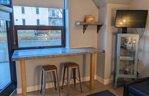 Traverse City Condo | Elegant Condo with Gorgeous Views of Old State Hospital