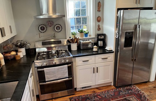 College Hill House | Historic Fox Point Cottage with Terrace, Gardens & Ocean View