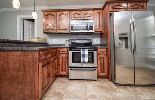 Cleveland House | Historic District Retreat Near Lee University - Family Friendly