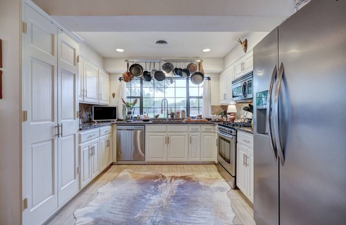 The Village Villa | Charming Historic Villa by Lake Hefner with Hot Tub & Pool Table