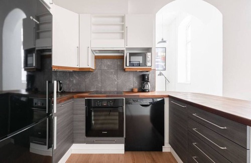 Tampere Apartment | Historic 1BR Loft with Sauna, Parking & Pet-Friendly Options