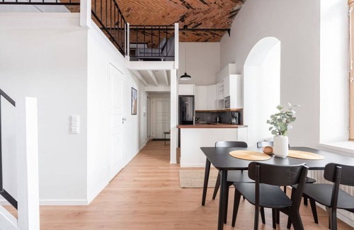 Tampere Apartment | Historic 1BR Loft with Sauna, Parking & Pet-Friendly Options