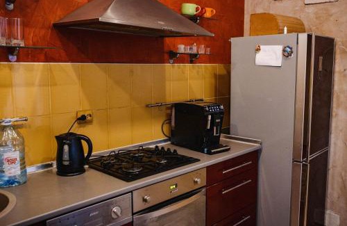 Uzhhorod Apartment | Historic Center Retreat: Pet Friendly with Hot Tub Access
