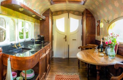 Fischach Other | Enchanting Vintage Circus Wagon Surrounded by Nature