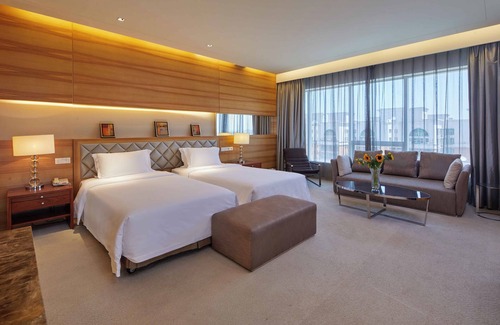 Houjie Hotel | Discover HJ International Hotel: Rated 9/10 with Spa & Pool