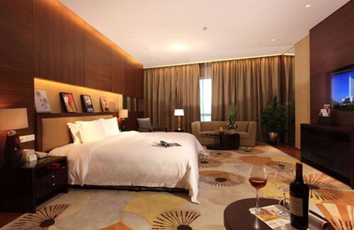 Houjie Hotel | Discover HJ International Hotel: Rated 9/10 with Spa & Pool