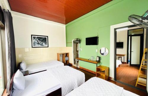 Dong Hoi House | Cozy Hoa Mai Hotel: Family-Friendly with Kitchen Amenities