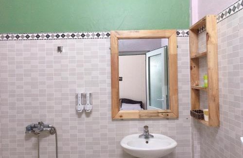 Dong Hoi House | Cozy Hoa Mai Hotel: Family-Friendly with Kitchen Amenities