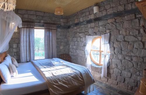 Bir Villa | Charming Hobbit House in Bir: Pet-Friendly & High Ratings