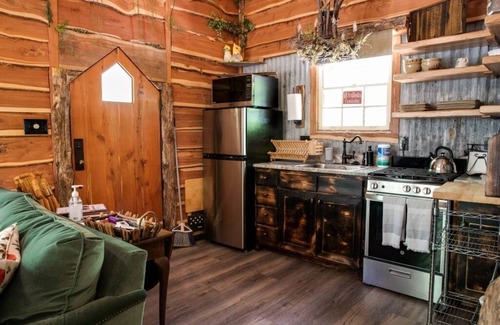 Dennis Cabin | Magical Hobbit Treehouse by the Waterfall on 350 Acres
