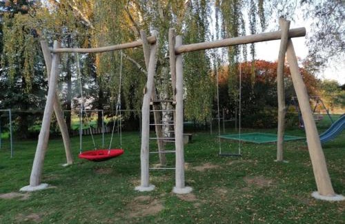 Triebischtal Apartment | Discover Hof Grübler: Family-Friendly Oasis with Pool