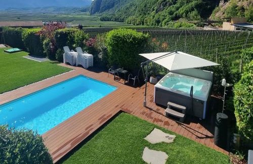 Andriano House | Relax at Hofer Hof: Oceanfront Pool & Spa Retreat