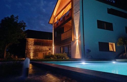 Renon Bed & Breakfast | Experience Hofgut Antlas: Oceanfront Escape with Pool