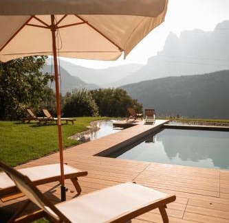 Renon Bed & Breakfast | Experience Hofgut Antlas: Oceanfront Escape with Pool